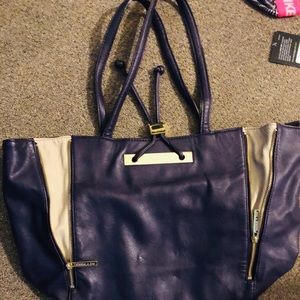 COPY - Like new large purple and tan purse w/gold accent